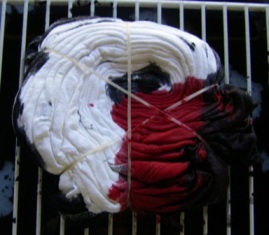 Apply red to a pie shape wedge that covers one third of the t-shirt.