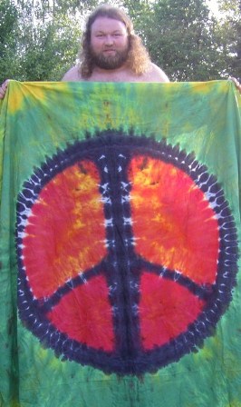 Erik teaches free how to tie dye lessons.